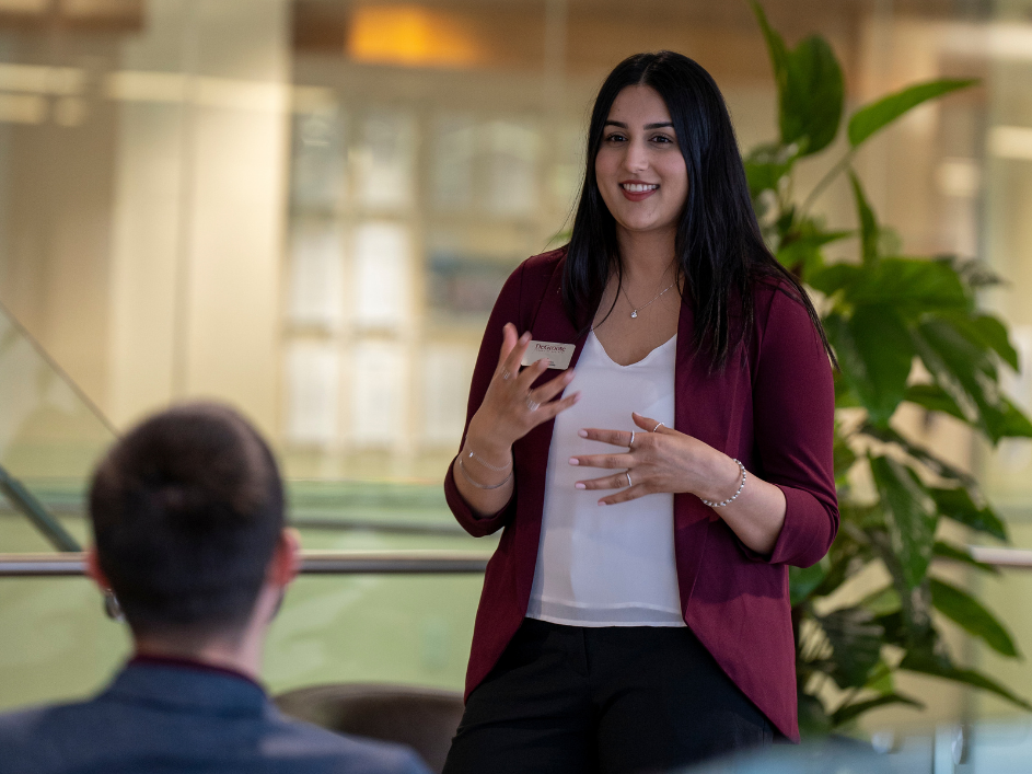 An advisor speaking with a student.